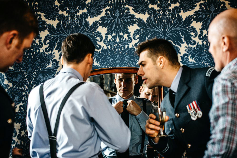 Groom getting ready at Hengrave Hall wedding photography