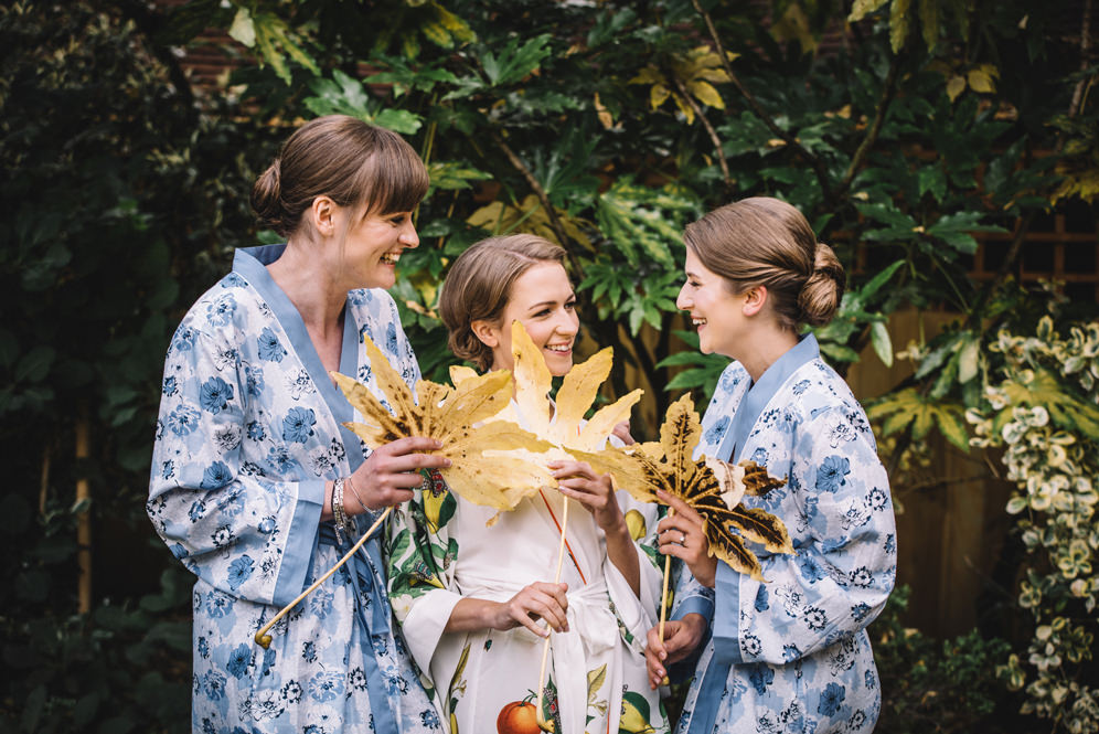 bride and bridesmaids wedding photo in the morning, wearing dressing gowns